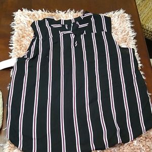 Beautiful sleeveless black blouse with white and b